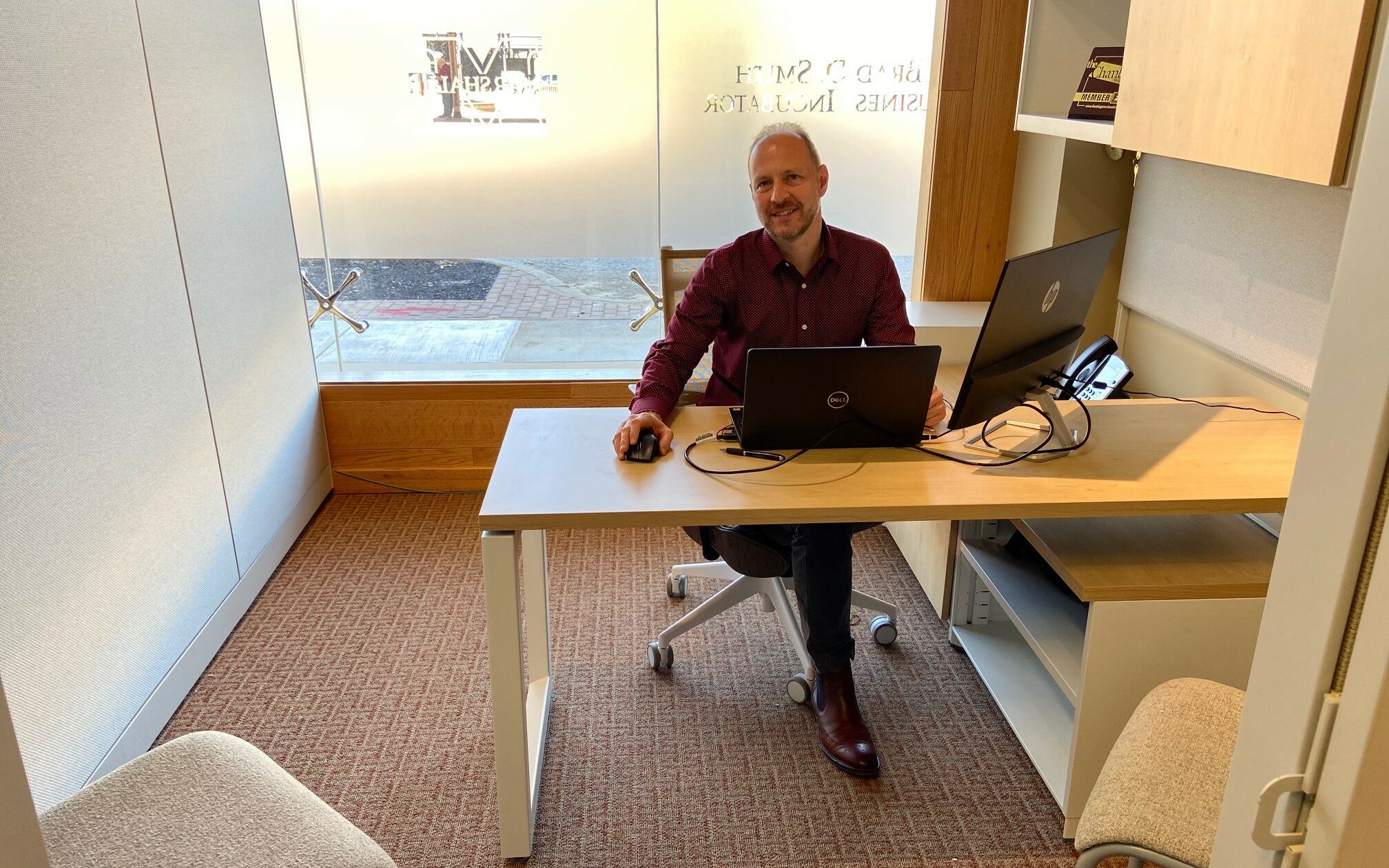 Lee Huffman sitting at his desk at APH Huntington